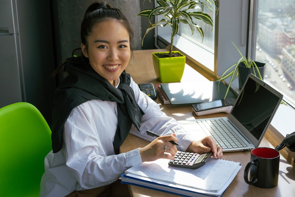 Accountant reviewing printed receipts with client
