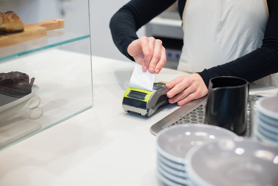Accountant reviewing printed receipts with client