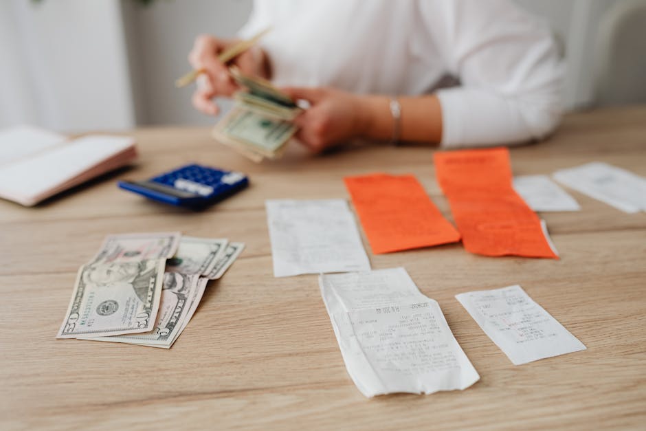 Person scanning a paper receipt with a phone