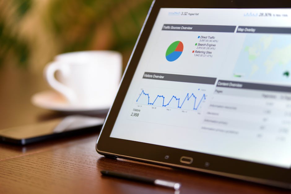 Receipts, smartphone, and laptop on a small business desk