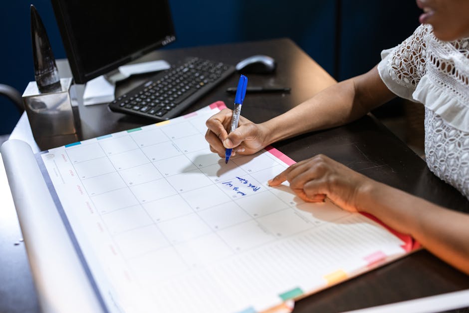 Receipts, smartphone, and laptop on a small business desk